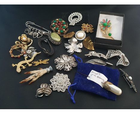 A good selection of costume broaches including vintage examples and Trafari broach 