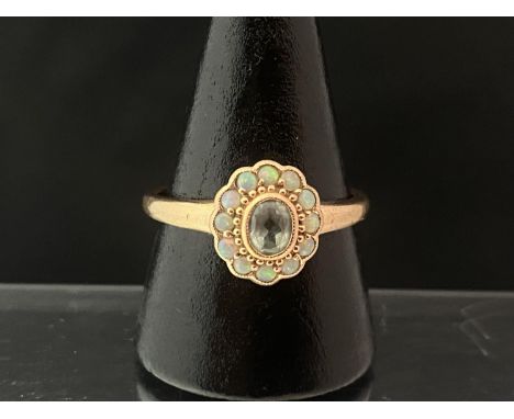 A vintage 9ct gold aquamarine and opal cluster ring size T1/2, 2.38g