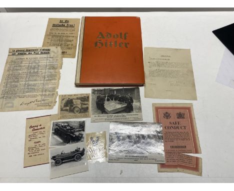 A 1936 Cigarette card photograph album book entitled 'Adolf Hitler' in German with various WW2 ephemera 