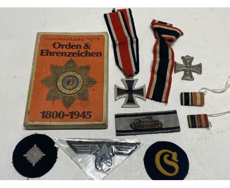 A job lot of assorted WW2 period German military patches, ribbons, bars etc (authenticity unknown)