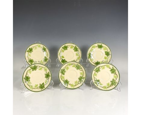 Glossy saucers adorned with green ivy pattern with green rims, reminiscent of Christmas. Franciscan Earthenware backstamps. D