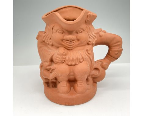 This sculpted planter was created to replicate the famous Toby jugs. With rough exterior and hole in the base to allow water 