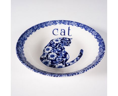 A charming Staffordshire Burleigh Calico Cat dish featuring a blue floral-patterned cat silhouette with the word "Cat" in bol