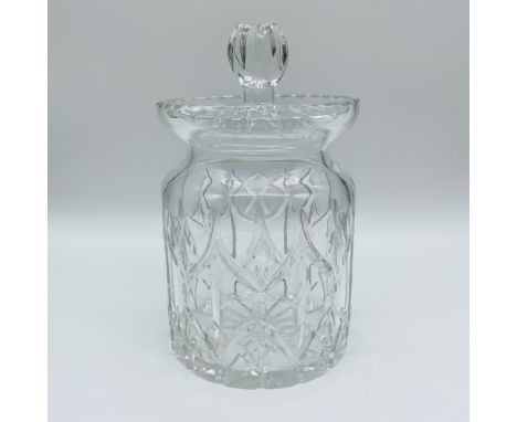 Polish-made 24% lead crystal jar with a matching lid, featuring intricate cut designs in a classic motif. The jar highlights 