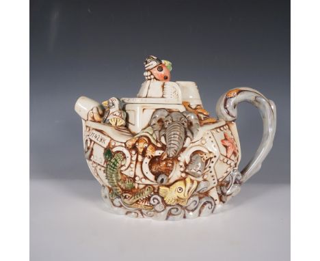 A whimsical The Crazy Cruet teapot, a limited edition collaboration between Harmony Kingdom and Cardew Design. This intricate