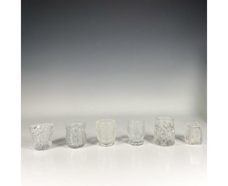 Set of six clear glass holders, featuring various patterns, including flowers and leaves with intricate glass cut designs. Di
