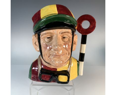 A Royal Doulton Jockey character jug, crafted in 1968. This ceramic jug features the detailed likeness of a jockey, adorned i