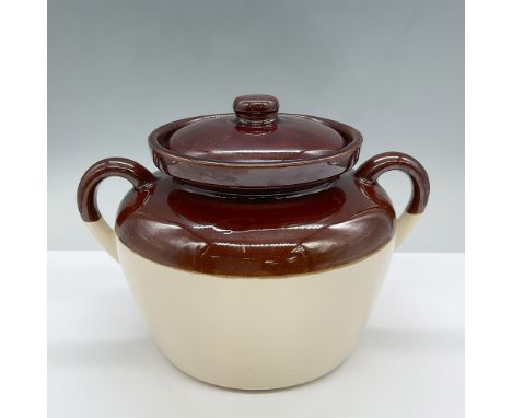 This rustic ceramic two tone jar is marked McCoy 342. Issued: 20the centuryDimensions: 9.5"L x 7.5"W x 7.25"HCountry of Origi