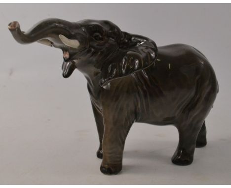 BESWICK pottery elephant small trunk stretching, no chips or cracks or damage repairs, Length is taken from trunk tip to tail