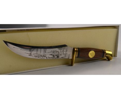 Sportsman knife. Overall length 25.5cm, blade 15cm long depicting a hog on the blade - a nice item