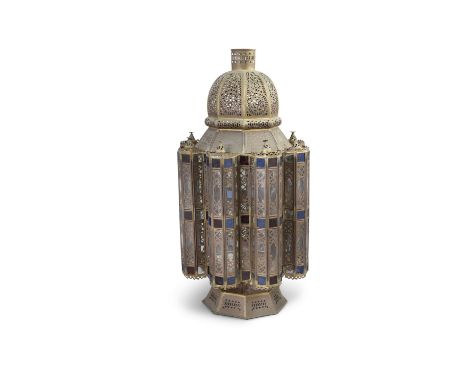 A LARGE MOROCCAN BRASS AND COLOURED GLASS LANTERN, of octagonal form with eight outer lobes, pierced decoration with red, blu