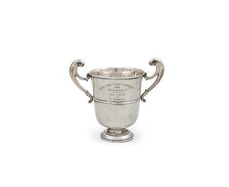 A GEORGIAN REVIVAL SILVER LOVING CUP,London c.1916, mark of Garrard & Co Ltd., of plain design, with raised scroll side handl