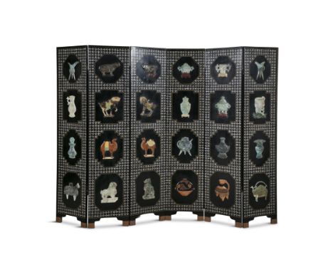 A LARGE CHINESE SIX FOLD INLAID EBON SCREEN, each panel decorated with mother of pearl diamond field and set with four carved