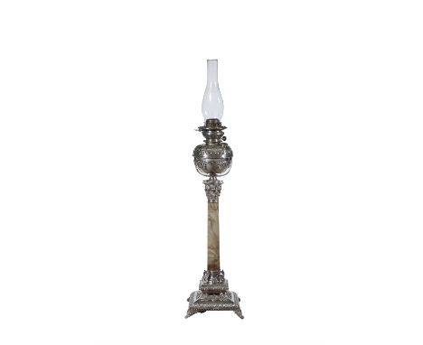 A SILVER PLATED OIL LAMP,with simulated marble stem on a raised base with open decoration and classical winged paw feet, 98cm