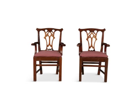 A PAIR OF MINIATURE 'CHIPPENDALE' MAHOGANY INFANTS ARMCHAIRSeach with pierced open work backs and upholstered drop in seats, 