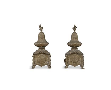 A PAIR OF FRENCH BRASS FIREDOGS OF CLASSICAL DESIGN,each applied with Roman portrait roundel, domed top with flambeau finial,