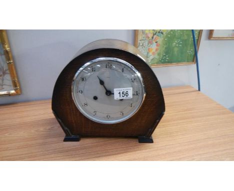 An Enfield mantel clock with key and pendulum