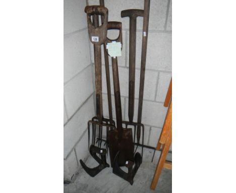 A quantity of old garden tools