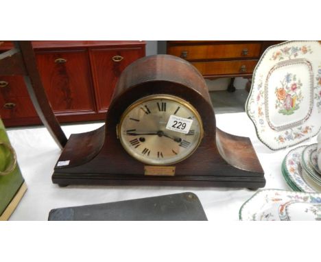 A Napoleon hat mantel clock