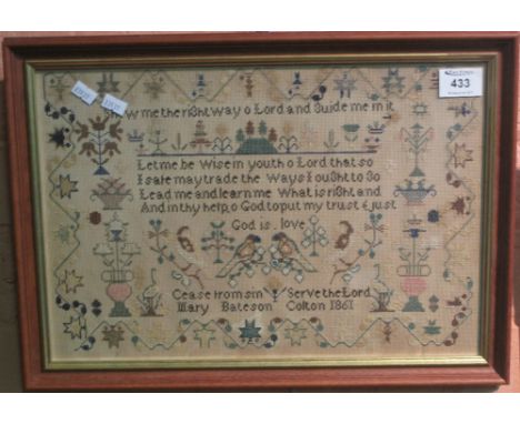Framed tapestry sampler by Mary Bateson-Colton, 1861 with religious text. 28 x 41cm approx.(B.P. 24% incl. VAT)