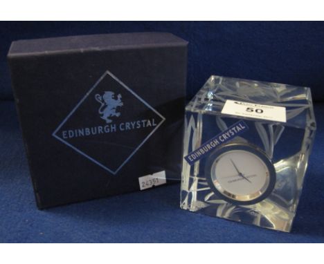 An Edinburgh crystal cut glass cube shaped foliate decorated mantle clock  "Tain Clock"  8cm high with original box.  (B.P. 2