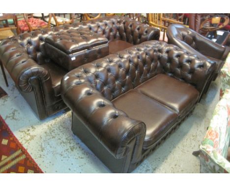 Modern Thomas Lloyd leather buttoned Chesterfield three seater sofa, another similar two seater, a matching pouffe with hinge