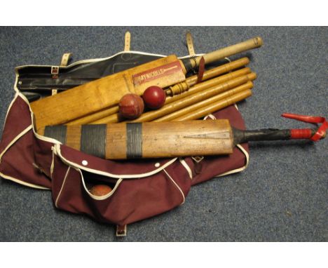 Vintage canvas cricket bag containing two bats, stumps, balls etc.  (B.P. 24% incl. VAT)