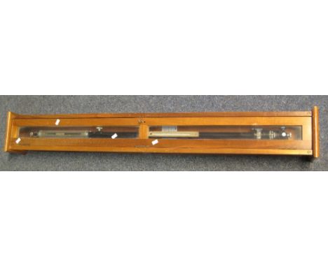 A Fortin scientific stick barometer with black enamelled body, in original glazed mahogany hanging case.  118cm the case over