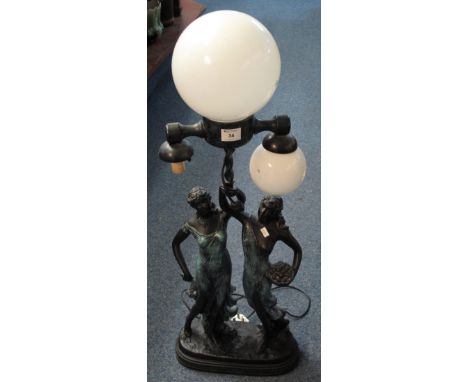 Modern figural table lamp with white glass globes.  95cm high approximately.  (B.P. 24% incl. VAT)