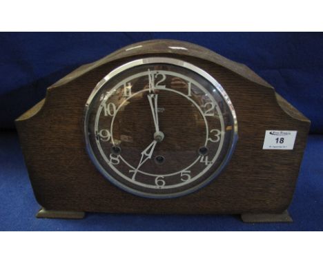 Mid 20th Century Smiths oak three train domed mantle clock.  23cm.  With pendulum and key.(B.P. 24% incl. VAT)