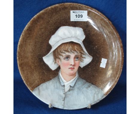 Bishop and Stonier porcelain plate later painted with portrait of a young girl, signed by Ellen Mallem.(B.P. 24% incl. VAT)