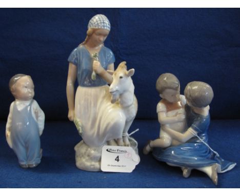 Group of BNG Danish porcelain figures to include girl with goat (AF), two children playing, and a standing baby with brush.  