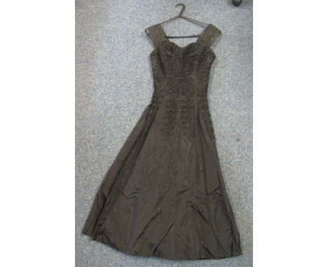 Black embroidered vintage 1950's evening dress by Blanes. (B.P. 24% incl. VAT)   CONDITION REPORT:  Areas of white staining o