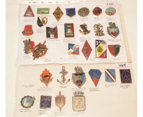 A collection of 30 French enamel pocket crests, to include: Dogs of War (Dog Handler), Forces in Germany, Force D'Action Rapi