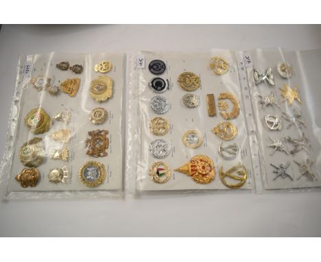A collection of 42 mixed Military cap badges, to include: Hungary, Bulgaria, Defence Force Jamaica, The Malay Federation Sign