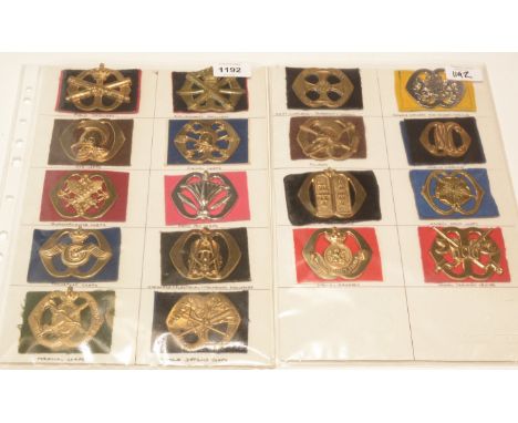 A collection of 18 Dutch cap badges on felt backing, to include: Field Artillery, Anti Aircraft Artillery, Signal Corps, Quar