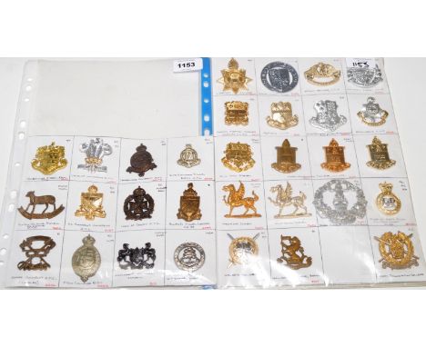 A collection of 31 School and Military Academy cap badges, to include: Cardiff University OTC, King Edward's School Bath OTC,