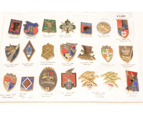 A collection of 21 French enamel pocket crests, to include: The 53rd Artillery Regiment, The 11th Artillery Regiment, The 8th