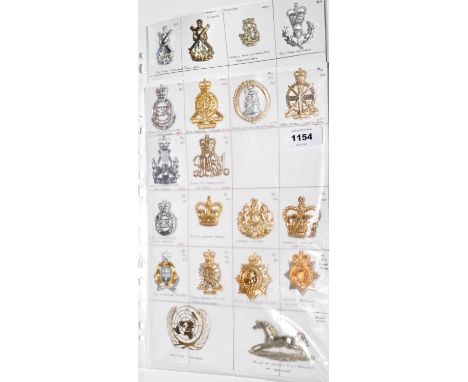 A collection of 14 mixed Military cap badges, to include: The Royal Military Academy, The Royal Hospital Chelsea, The Army Ap
