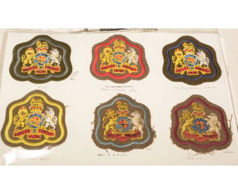 A collection of approximately 130 Warrant Officer's badges and stripes, to include: Royal Signals, Royal Artillery, Household
