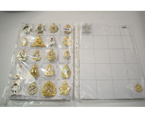 A collection of Australian Military cap badges, to include: Royal Australian Corps of Transport, Royal Australian Army Servic