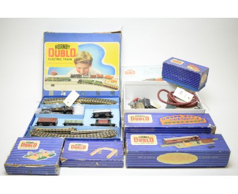 A Hornby Dublo "Tank Goods B.R." train set, EDG17; a Royal Mail T.P.O. mail van set; a signal cabin; and other accessories, m