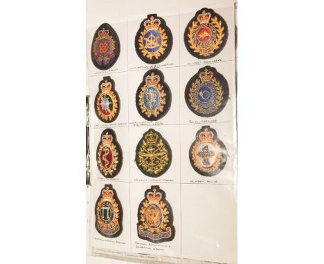 A collection of approximately 250 Canadian cloth trade, caps and formation badges, to include: Military Intelligence Branch, 