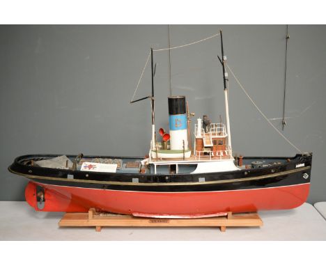 A scale model of the Tyne tug boat Annie of Ryton, of painted wooden construction, with full metal deck fittings, powered by 