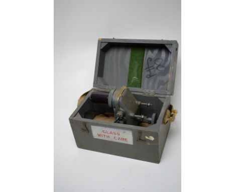 A ship's red glass port light, Pattern 212, in wooden box, complete with clear glass shade, dimensions of box 28 x 18 x 20cms