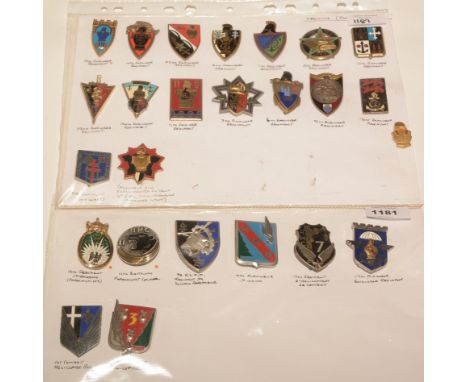 A collection of 25 French enamel pocket crests, to include: The 13th Regiment Dragoons (Parachutists), The 11th Battalion Par