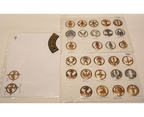 A collection of 30 French military beret badges, to include: The Engineers, Infantry Artillery Units, Cavalry, Medical Light 