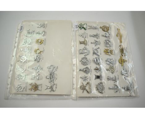 A collection of 48 Indian and Pakistani cap badges, to include: 2nd Lancers, 11th Lancers, 88th Lancers, 65th Cavalry Regimen