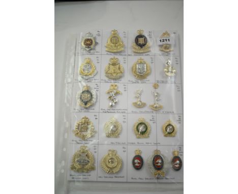 A collection of 21 New Zealand Military cap badges, to include: Royal New Zealand Army Service Corps, Royal New Zealand Army 