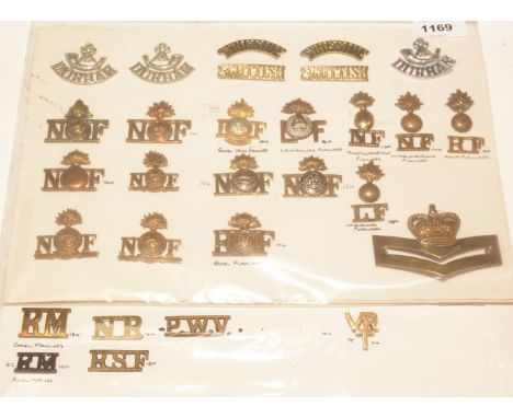 A collection of 26 mainly Infantry metal shoulder titles, to include: The Durham Light Infantry, The Tyneside Scottish, The R